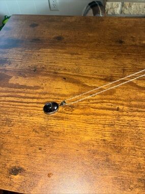 Polished Silver Chain Necklace with Black Oval Pendant